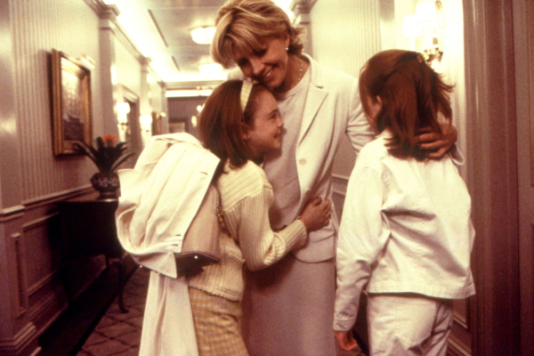 Natasha Richardson and Lindsay Lohan hugging in a scene from The Parent Trap